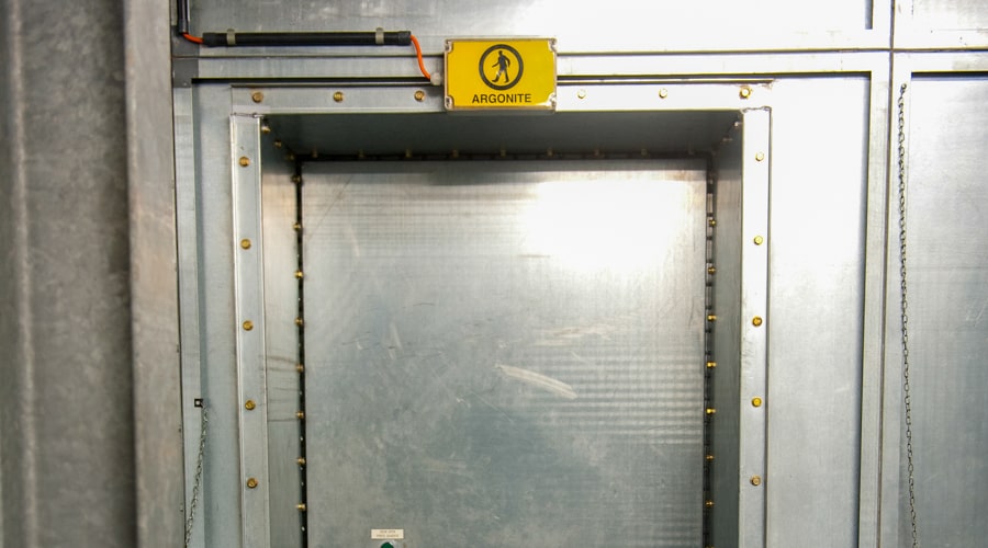 door in the e-bunker with a yellow sign of Argonite above it